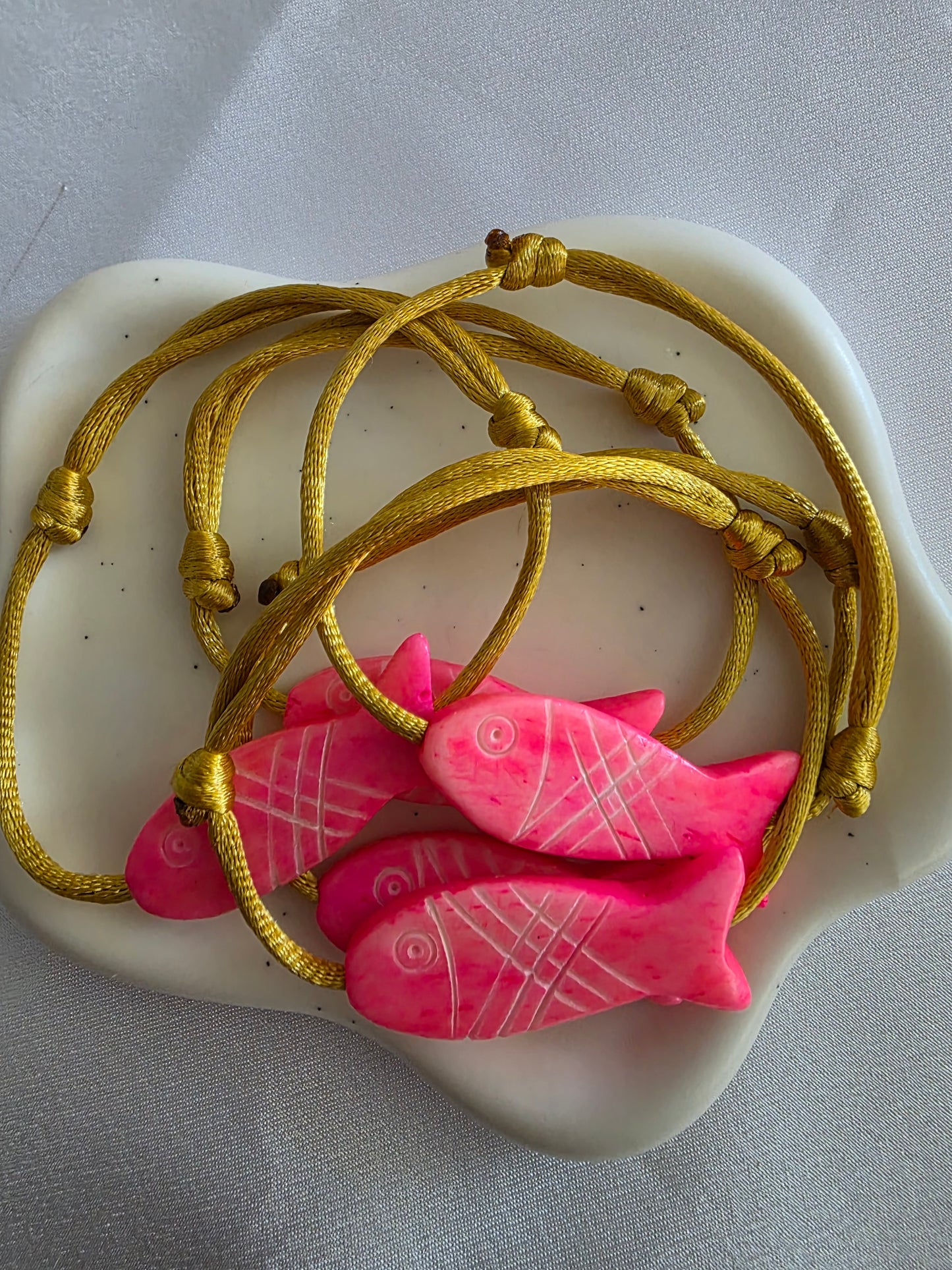 Pinky fish bracelet