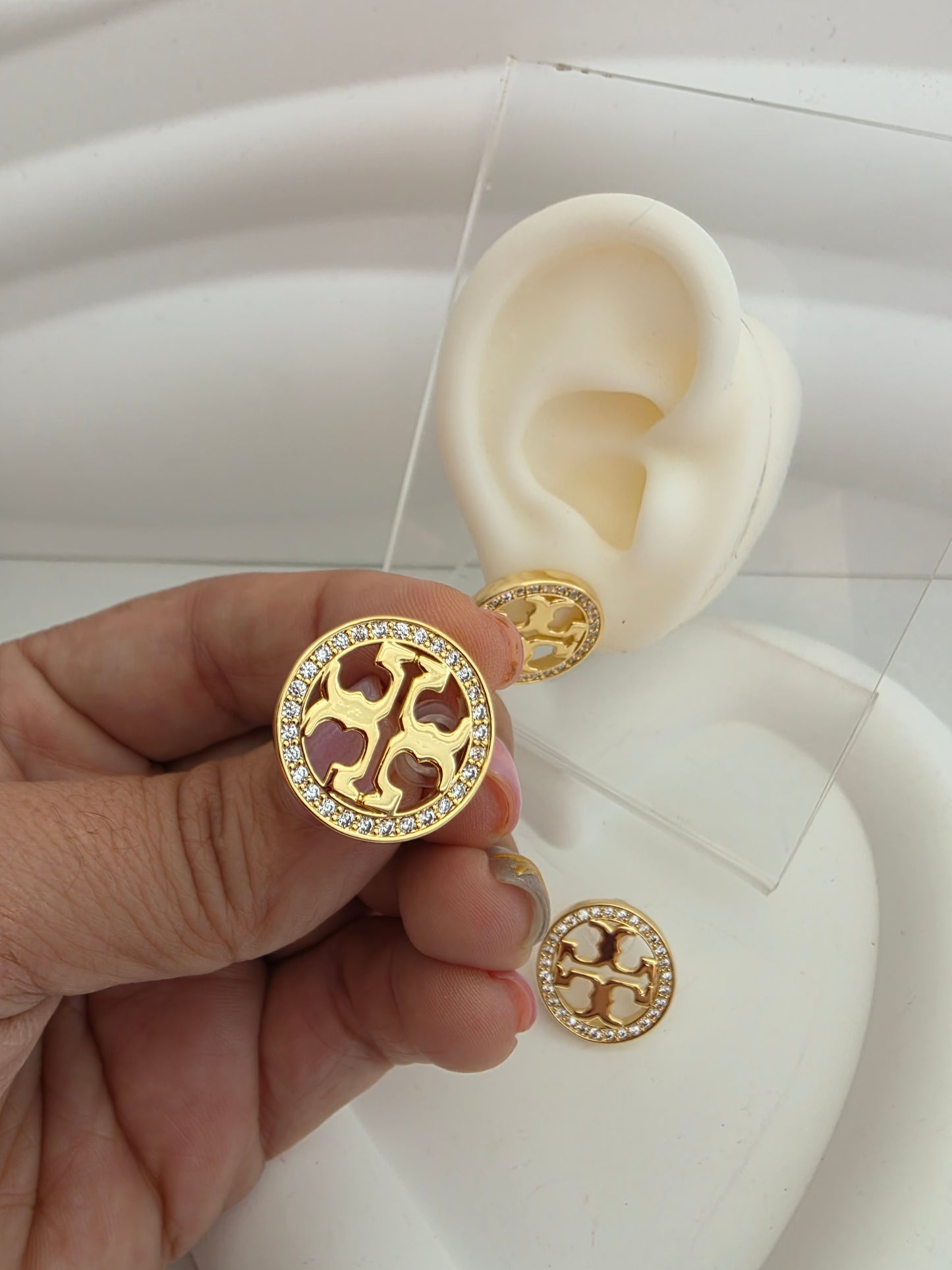 TB earrings