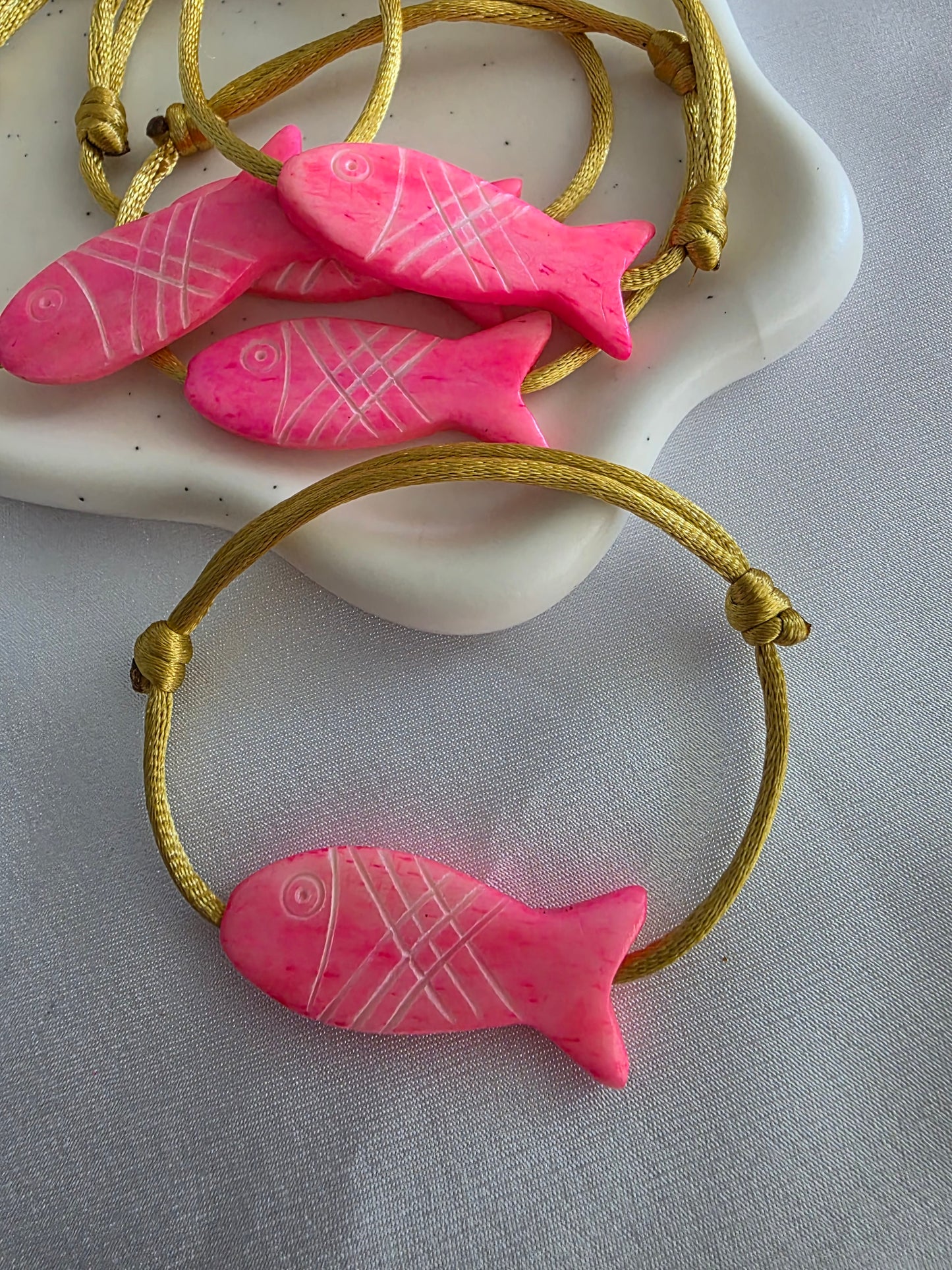 Pinky fish bracelet